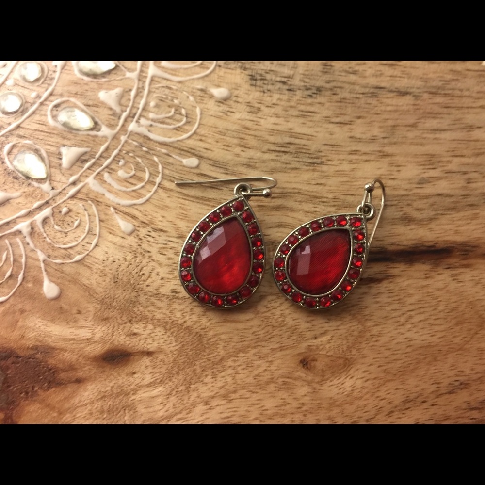 Red pear shaped earrings.